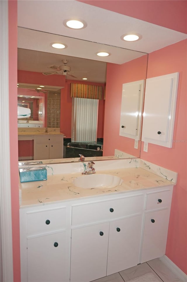 1128 Rum Cay Ct, Punta Gorda, FL 33950 - bathroom with vanity, recessed lighting, and tile patterned flooring