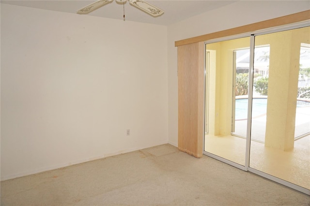 1128 Rum Cay Ct, Punta Gorda, FL 33950 - carpeted empty room with ceiling fan and baseboards