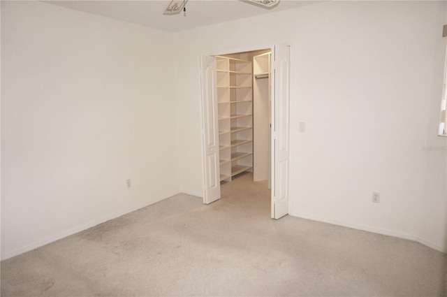 1128 Rum Cay Ct, Punta Gorda, FL 33950 - unfurnished bedroom with light colored carpet, a spacious closet, and a closet
