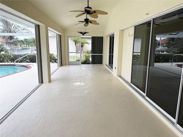 1128 Rum Cay Ct, Punta Gorda, FL 33950 - unfurnished sunroom with vaulted ceiling and a water view