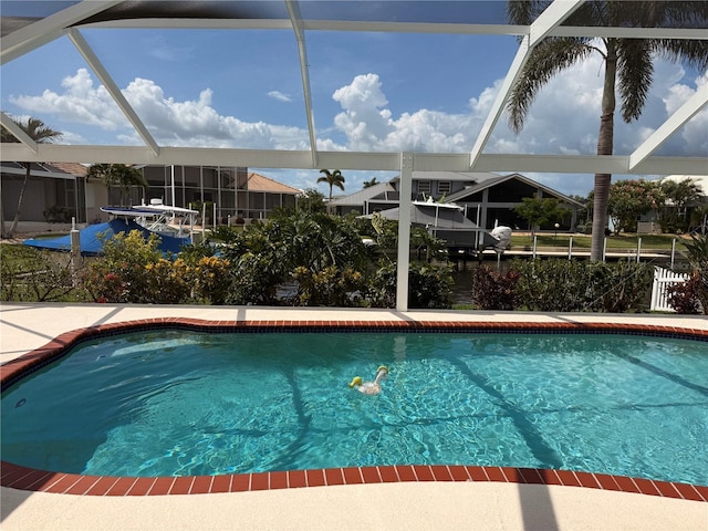 1128 Rum Cay Ct, Punta Gorda, FL 33950 - swimming pool featuring a lanai and a patio