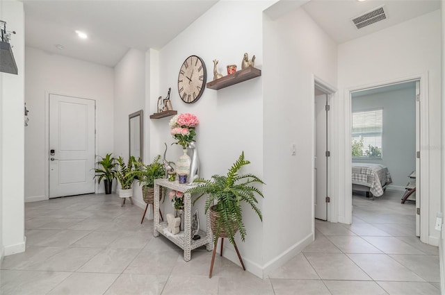 24348 Nicobar Ln, Punta Gorda, FL 33955 - hall with light tile patterned flooring and recessed lighting