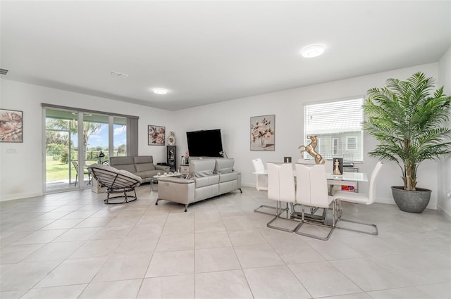 24348 Nicobar Ln, Punta Gorda, FL 33955 - living area with light tile patterned flooring and baseboards