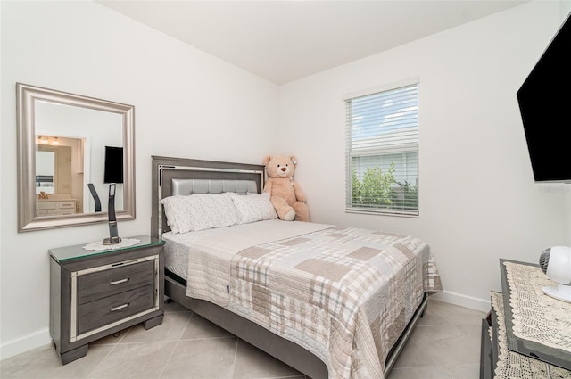 24348 Nicobar Ln, Punta Gorda, FL 33955 - bedroom featuring light tile patterned floors