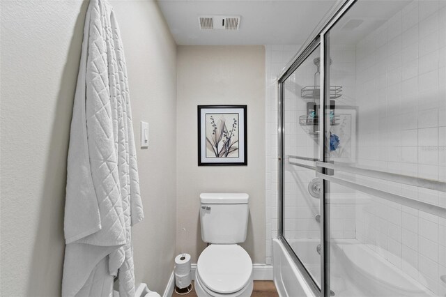 19505 Quesada Ave Unit Vv201, Port Charlotte, FL 33948 - full bath featuring toilet and shower / bath combination with glass door