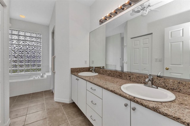 1605 Palace Ct, Punta Gorda, FL 33980 - bathroom featuring double vanity, tile patterned floors, and ceiling fan