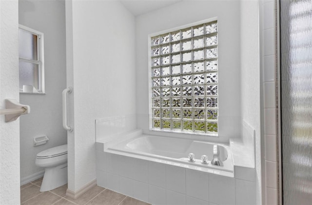 1605 Palace Ct, Punta Gorda, FL 33980 - bathroom featuring a garden tub and tile patterned flooring