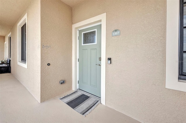 900 E Marion Ave Unit 1203, Punta Gorda, FL 33950 - property entrance featuring stucco siding