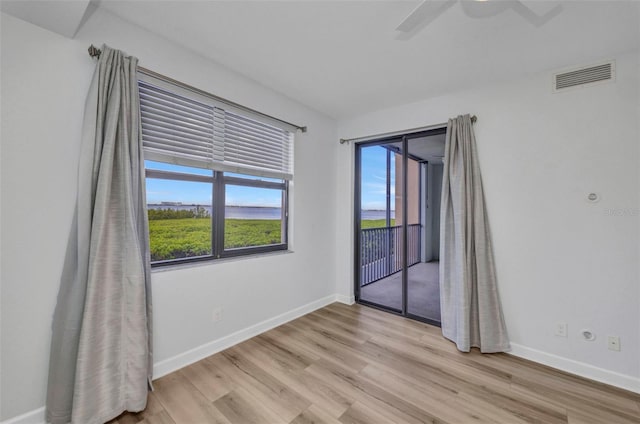 900 E Marion Ave Unit 1203, Punta Gorda, FL 33950 - unfurnished room featuring light wood-style floors and a ceiling fan