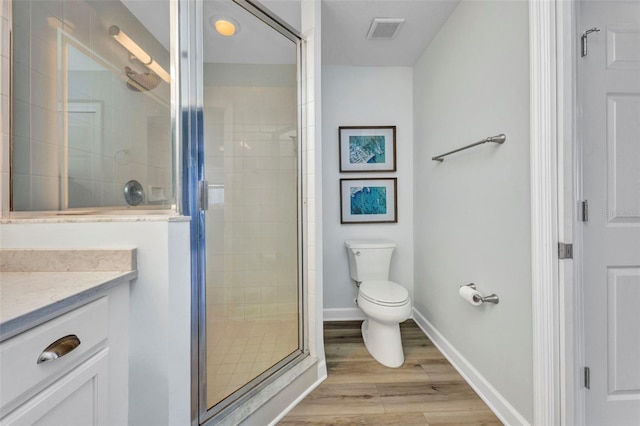 900 E Marion Ave Unit 1203, Punta Gorda, FL 33950 - full bath with vanity, wood finished floors, and a stall shower