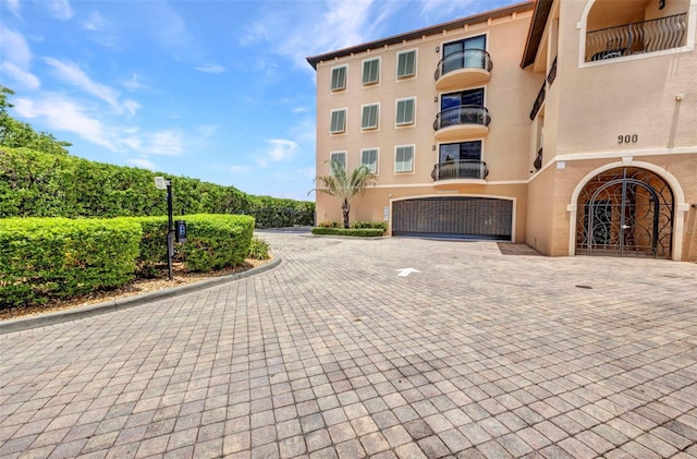 900 E Marion Ave Unit 1203, Punta Gorda, FL 33950 - view of building exterior with decorative driveway