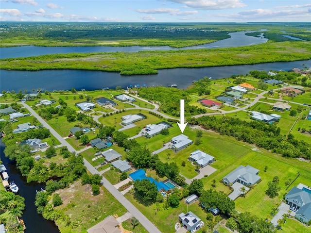 28960 Gin Ln, Punta Gorda, FL 33982 - aerial perspective of suburban area with a large body of water