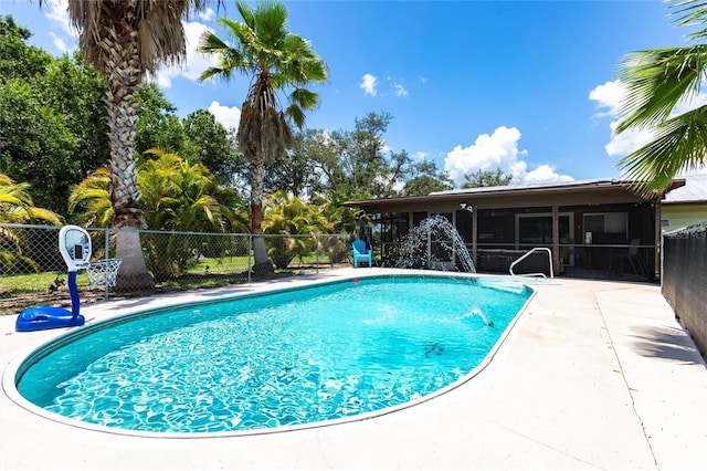 8513 Heister St, Punta Gorda, FL 33982 - view of pool featuring a sunroom and a patio area