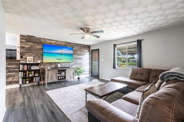 8513 Heister St, Punta Gorda, FL 33982 - living area with a ceiling fan and dark wood finished floors