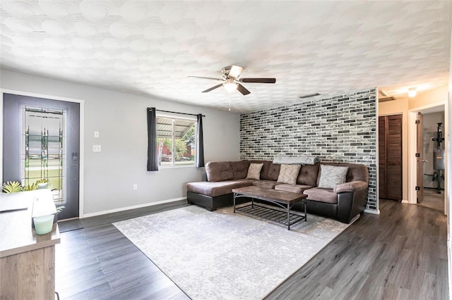 8513 Heister St, Punta Gorda, FL 33982 - living room with ceiling fan, a textured ceiling, and wood finished floors