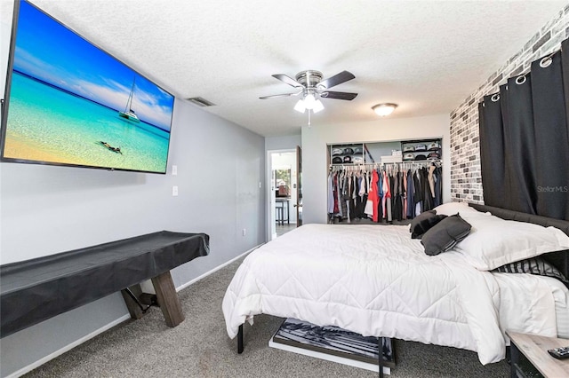 8513 Heister St, Punta Gorda, FL 33982 - bedroom with carpet flooring, a closet, a textured ceiling, and a ceiling fan