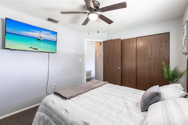 8513 Heister St, Punta Gorda, FL 33982 - bedroom with carpet flooring, a closet, and a ceiling fan