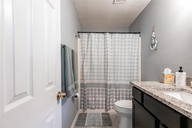 8513 Heister St, Punta Gorda, FL 33982 - bathroom featuring vanity, a textured ceiling, and a shower with shower curtain