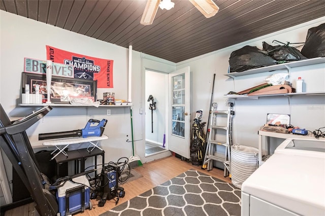 8513 Heister St, Punta Gorda, FL 33982 - miscellaneous room with wood finished floors, washing machine and clothes dryer, and ceiling fan