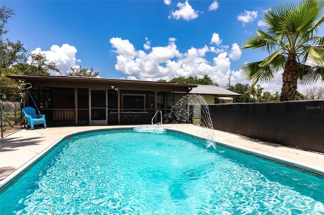8513 Heister St, Punta Gorda, FL 33982 - view of pool with a sunroom and a patio