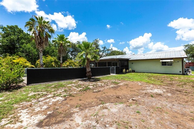 8513 Heister St, Punta Gorda, FL 33982 - view of yard with a sunroom