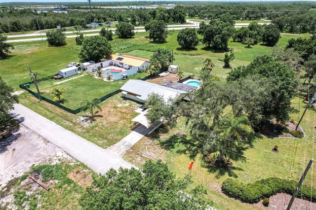 8513 Heister St, Punta Gorda, FL 33982 - aerial view of property and surrounding area with a tree filled landscape