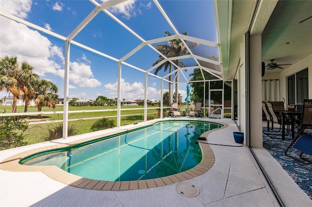 2105 Deborah Dr, Punta Gorda, FL 33950 - outdoor pool featuring a patio, ceiling fan, and glass enclosure
