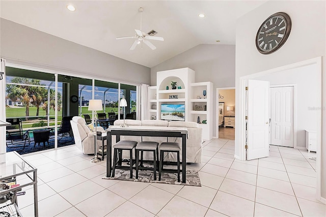 2105 Deborah Dr, Punta Gorda, FL 33950 - living room featuring a ceiling fan, high vaulted ceiling, and light tile patterned floors