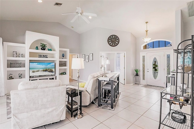 2105 Deborah Dr, Punta Gorda, FL 33950 - living room with ceiling fan, high vaulted ceiling, and light tile patterned floors