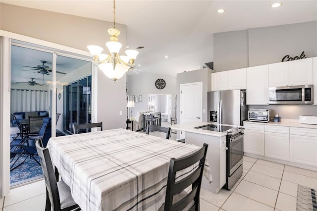 2105 Deborah Dr, Punta Gorda, FL 33950 - dining space featuring a chandelier, ceiling fan, light tile patterned floors, and recessed lighting