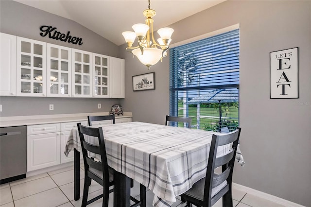 2105 Deborah Dr, Punta Gorda, FL 33950 - dining space featuring a chandelier, lofted ceiling, and light tile patterned floors