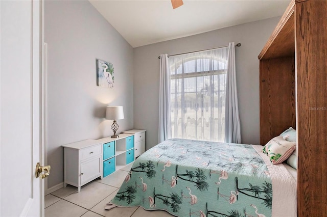2105 Deborah Dr, Punta Gorda, FL 33950 - bedroom with light tile patterned floors and vaulted ceiling