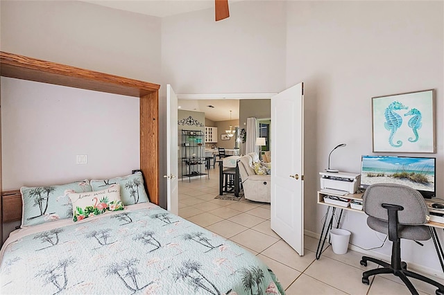 2105 Deborah Dr, Punta Gorda, FL 33950 - bedroom featuring light tile patterned floors, a towering ceiling, and an office area