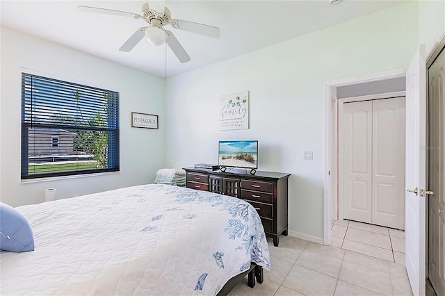 2105 Deborah Dr, Punta Gorda, FL 33950 - bedroom with light tile patterned flooring and a ceiling fan