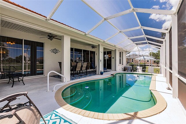 2105 Deborah Dr, Punta Gorda, FL 33950 - swimming pool with ceiling fan, a patio area, and a lanai