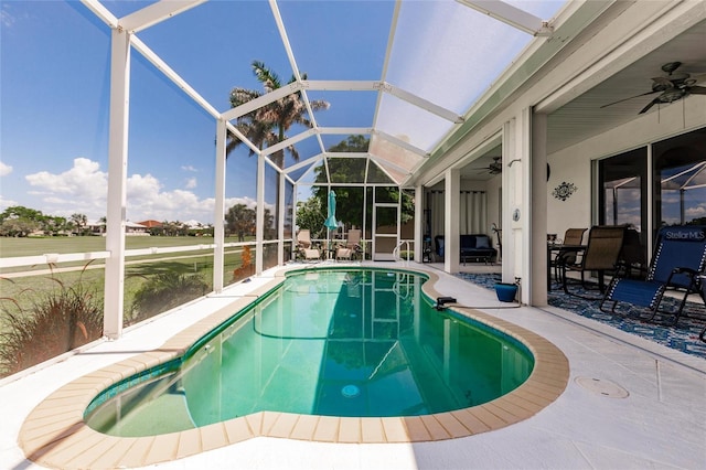 2105 Deborah Dr, Punta Gorda, FL 33950 - swimming pool featuring ceiling fan, a patio area, and glass enclosure