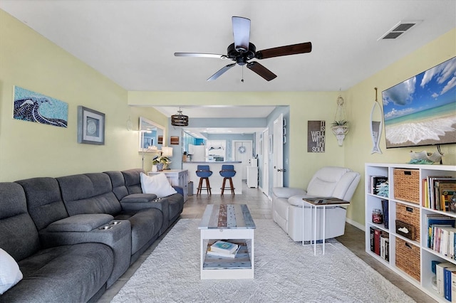 26310 Rampart Blvd Unit 504, Punta Gorda, FL 33983 - living room featuring a ceiling fan