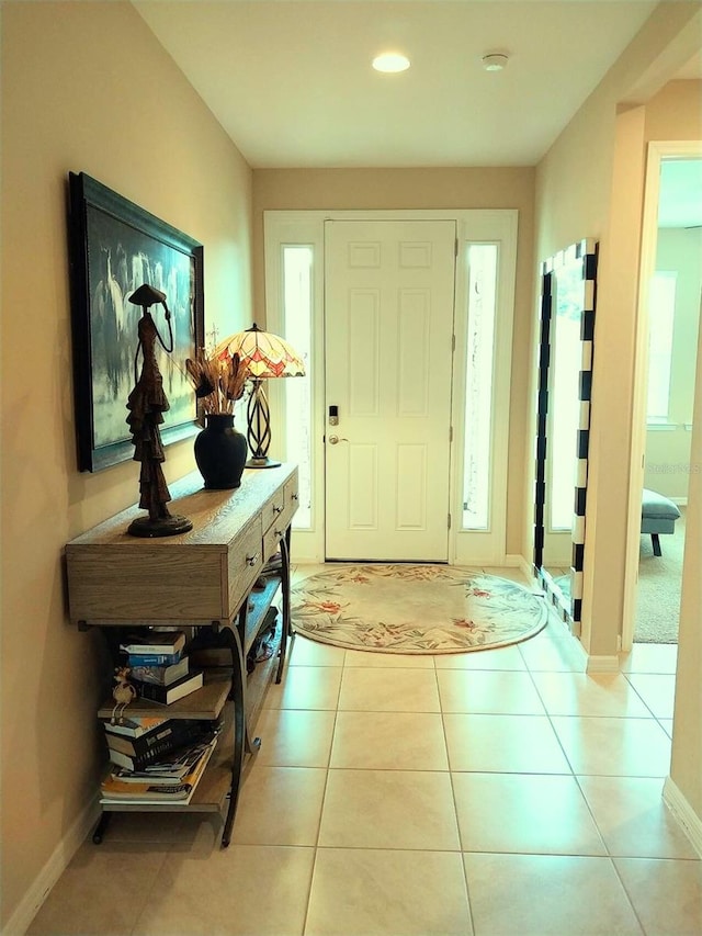 25224 Lahore Ln, Punta Gorda, FL 33983 - foyer with light tile patterned floors and recessed lighting