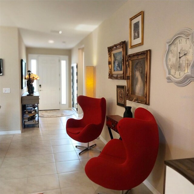 25224 Lahore Ln, Punta Gorda, FL 33983 - foyer with tile patterned flooring and baseboards