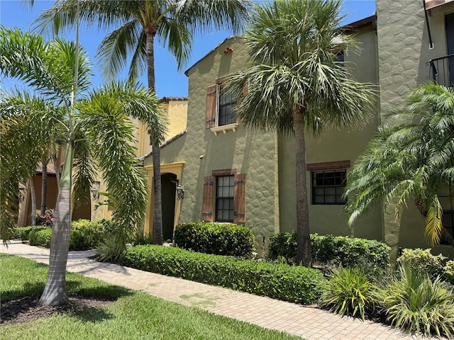 11220 Paseo Grande Blvd Unit 5207, Fort Myers, FL 33912 - mediterranean / spanish house featuring stucco siding
