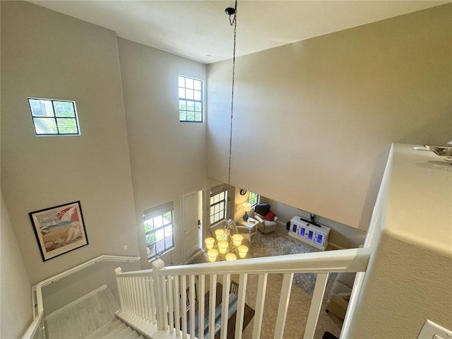 11220 Paseo Grande Blvd Unit 5207, Fort Myers, FL 33912 - staircase featuring a high ceiling and baseboards