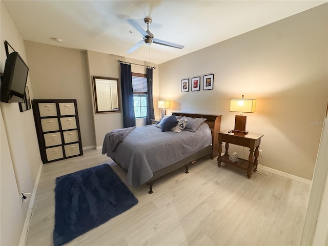 11220 Paseo Grande Blvd Unit 5207, Fort Myers, FL 33912 - bedroom with wood finished floors and a ceiling fan