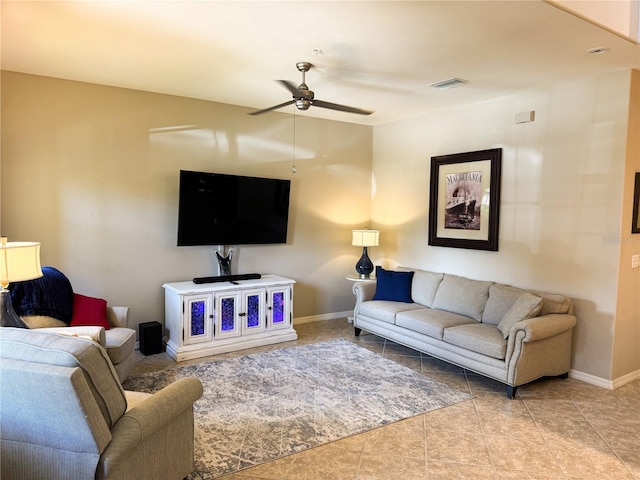 11220 Paseo Grande Blvd Unit 5207, Fort Myers, FL 33912 - tiled living room with a ceiling fan and baseboards
