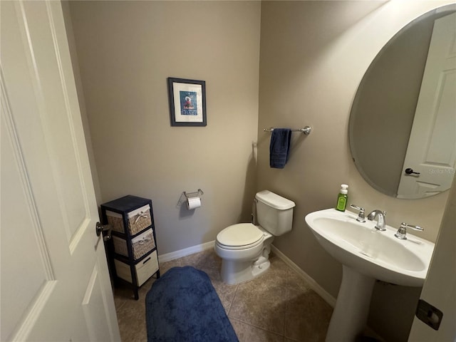 11220 Paseo Grande Blvd Unit 5207, Fort Myers, FL 33912 - half bathroom with toilet and tile patterned floors