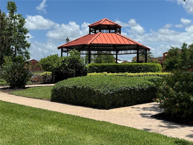 11220 Paseo Grande Blvd Unit 5207, Fort Myers, FL 33912 - surrounding community with a gazebo and a yard