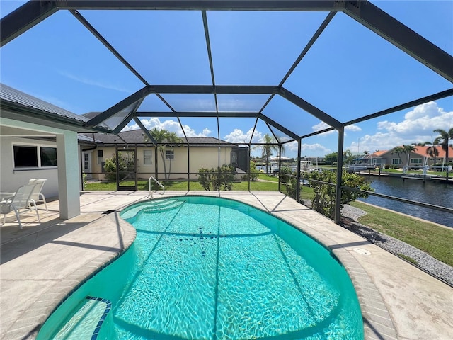 2526 Brazilia Ct, Punta Gorda, FL 33950 - swimming pool featuring a patio, a water view, and a lanai