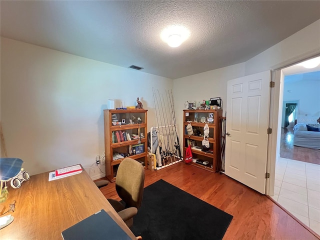 2526 Brazilia Ct, Punta Gorda, FL 33950 - office featuring wood finished floors and a textured ceiling