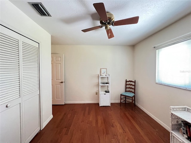 2526 Brazilia Ct, Punta Gorda, FL 33950 - sitting room with dark wood-type flooring and ceiling fan