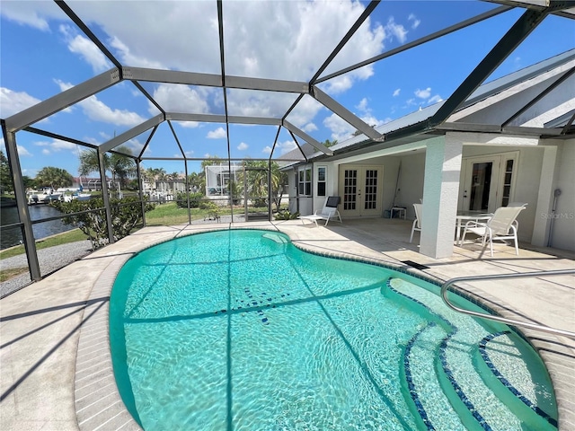 2526 Brazilia Ct, Punta Gorda, FL 33950 - swimming pool with french doors, a patio, and a lanai