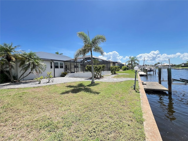 2526 Brazilia Ct, Punta Gorda, FL 33950 - dock area with a yard, a water view, and a lanai